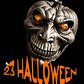 Skull-like pumpkin with glowing eyes and '23 Halloween' text on a black background